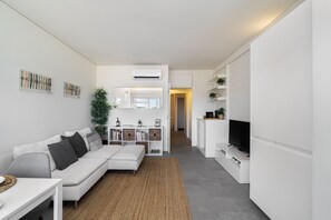 Apartment, 1 Bedroom | Living area | Flat-screen TV