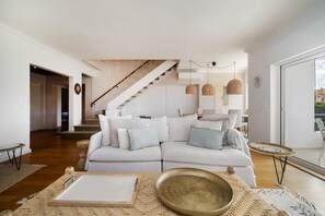 Apartment, 3 Bedrooms | Living area | Flat-screen TV