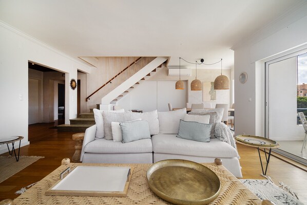 Apartment, 3 Bedrooms | Living area | Flat-screen TV