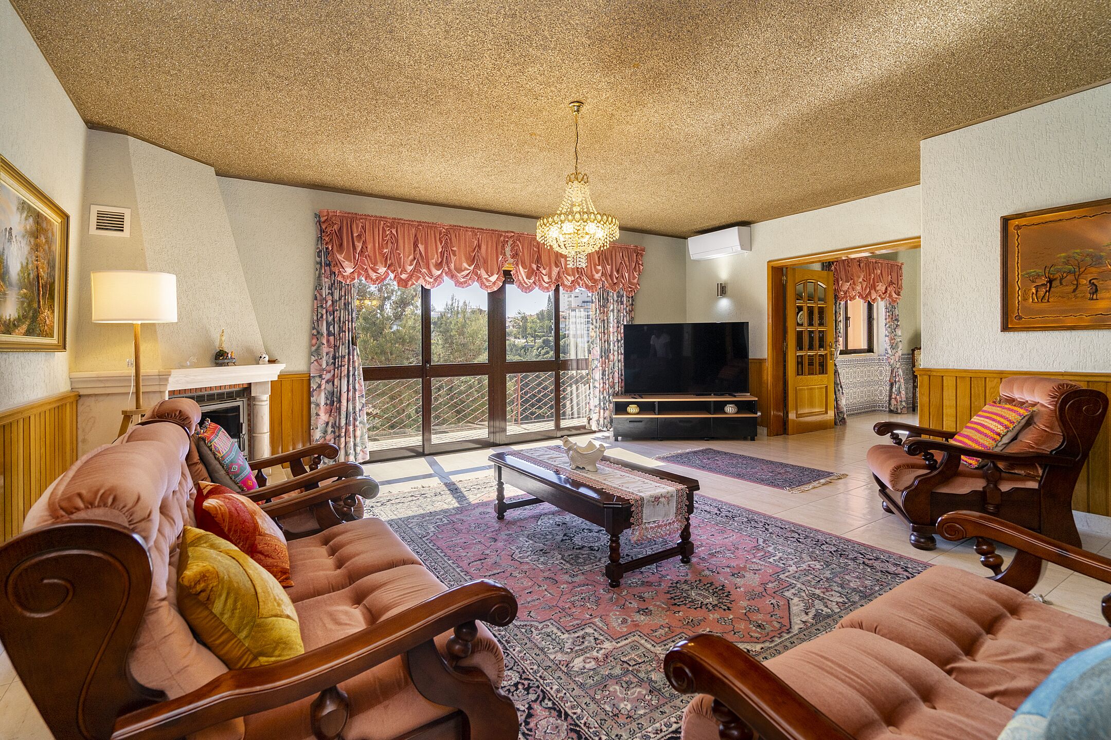 Apartment, 4 Bedrooms | Living area | Flat-screen TV