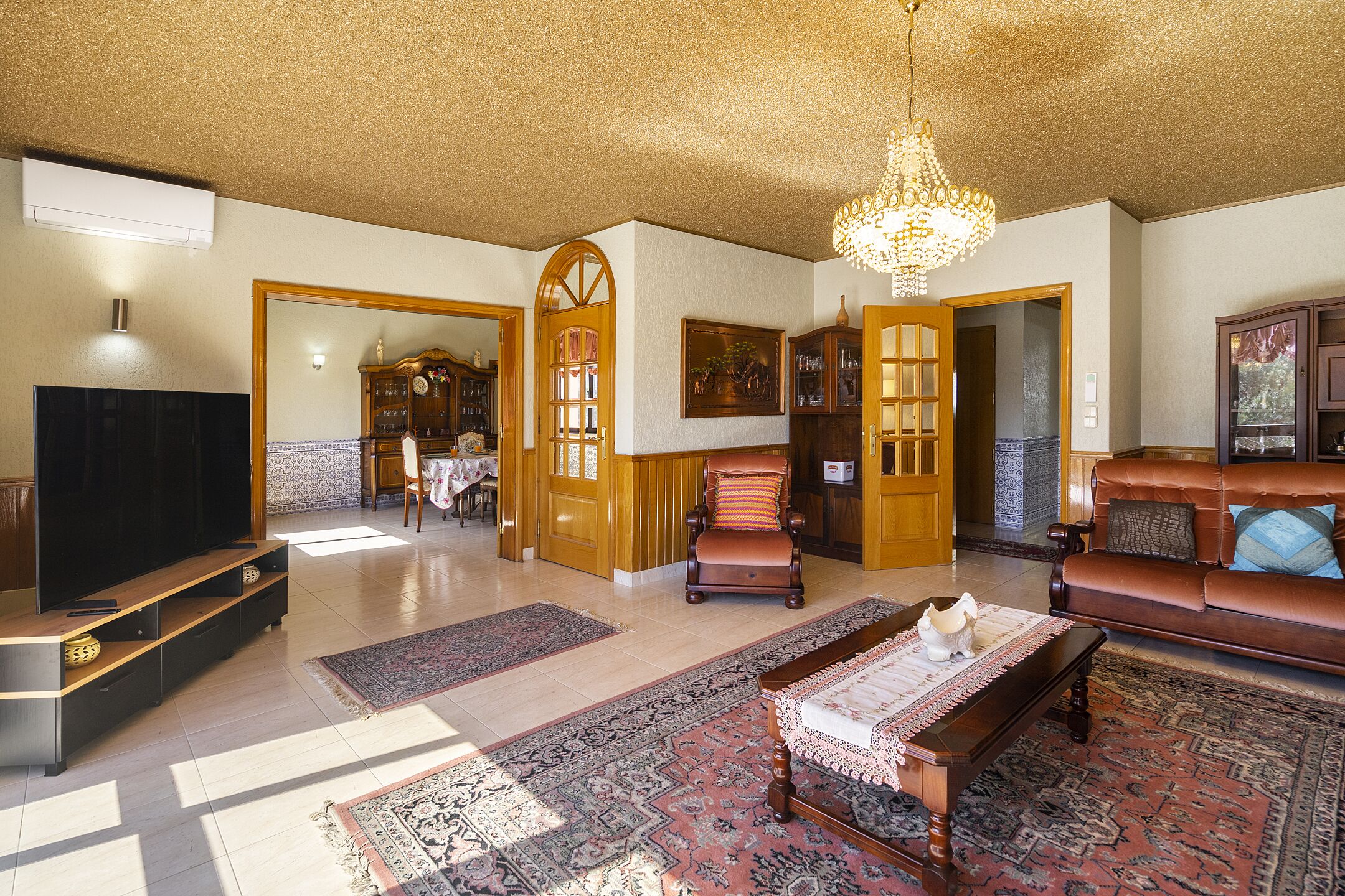 Apartment, 4 Bedrooms | Living area | Flat-screen TV