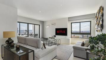 Apartment, 2 Bedrooms | Living area | Flat-screen TV