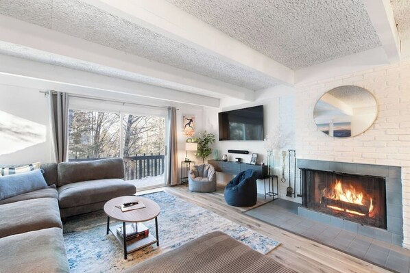 Cozy couch sits many….