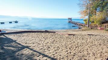 On the beach, sun loungers, beach towels