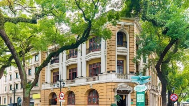 A historic building with multiple balconies and a central entrance. - ZhuXing Hotel (Guangzhou)