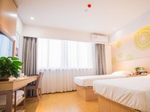 A hotel room with a desk, two beds, a TV, and a large window with curtains. - Greentree Inn Yangzhou Jiangdu Xiaoji Town South Zhongxing Road Express Hotel (Yangzhou)