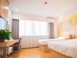A hotel room with a desk, two beds, a TV, and a large window with curtains. - Greentree Inn Yangzhou Jiangdu Xiaoji Town South Zhongxing Road Express Hotel (Yangzhou)