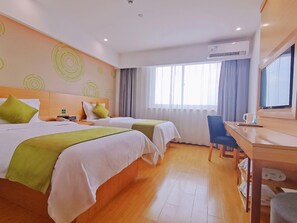 A hotel room with two beds, a desk, a chair, and a large window with curtains. - Greentree Inn Yangzhou Jiangdu Xiaoji Town South Zhongxing Road Express Hotel (Yangzhou)
