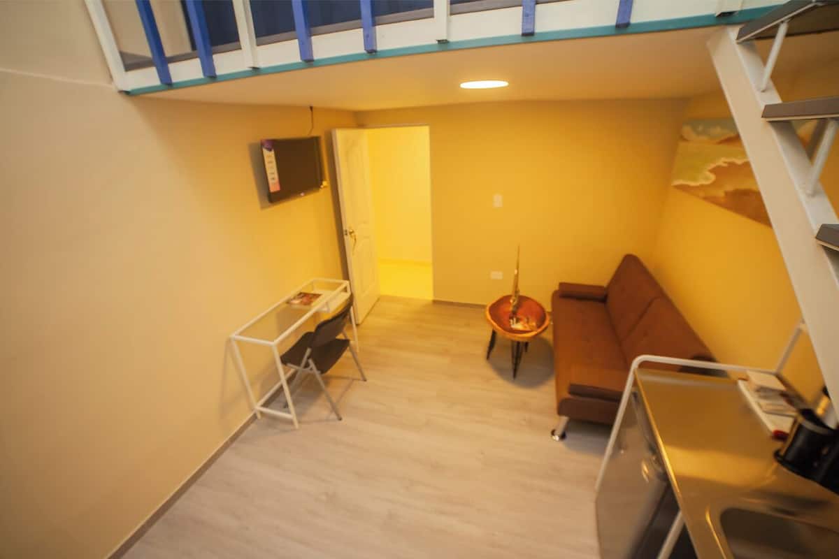 Chambre Deluxe | Coin séjour