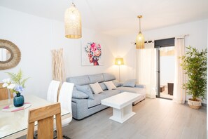 TV - Casa Flor del Rocío: Modern Comfort near Seville with Wi-Fi and Parking (La Rinconada)