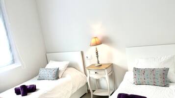 4 dormitorios, tabla de planchar con plancha, wifi gratis y ropa de cama