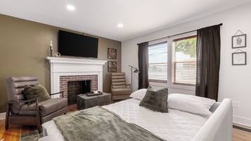 2 habitaciones, tabla de planchar con plancha y cuna de viaje