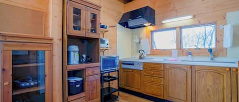 Fridge, microwave, stovetop, cookware/dishes/utensils