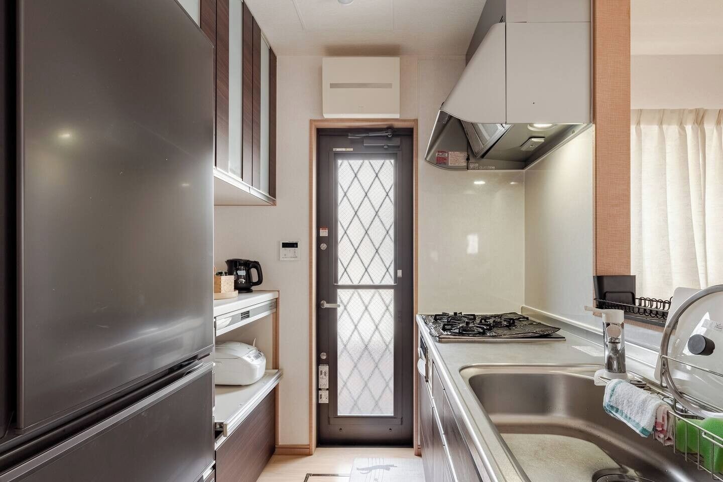 Fridge, microwave, stovetop, cookware/dishes/utensils