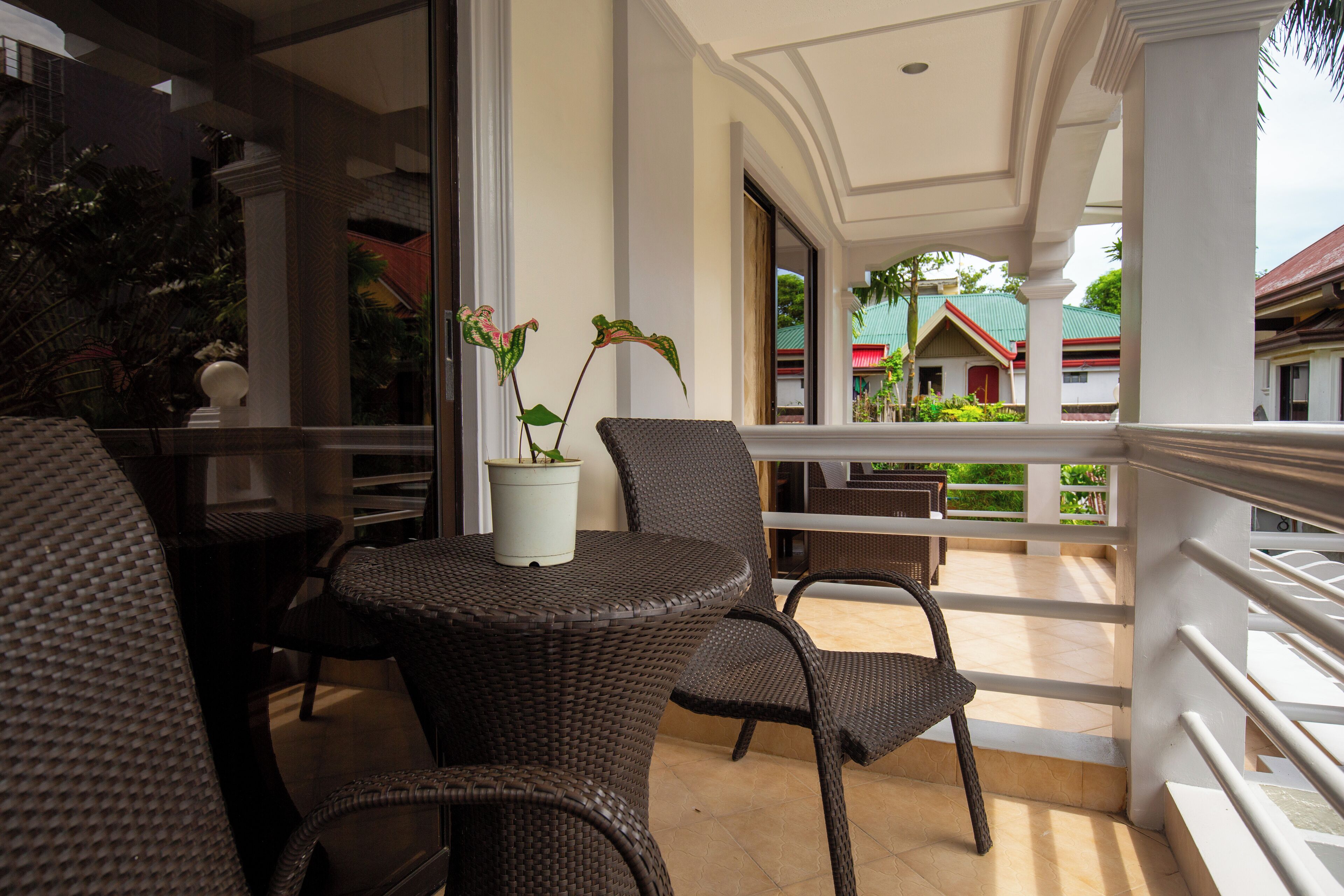 Habitación cuádruple Deluxe | Terraza o patio