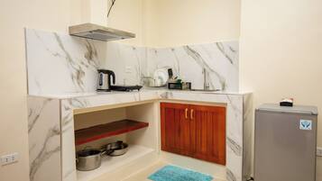 Basic Quadruple Room | Private kitchen