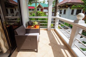 Suite familiar, vistas al jardín | Terraza o patio