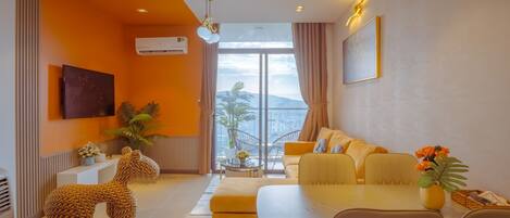 Apartemen Ekonomi, 1 kamar tidur, balkon | Area keluarga | Televisi layar datar 45-inci dengan saluran TV kabel dan film berbayar