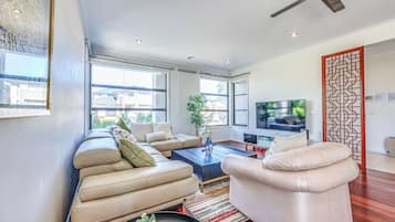 Deluxe House, Lake View | Living area | Flat-screen TV