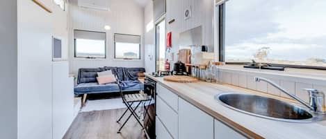 Fridge, microwave, stovetop, coffee/tea maker