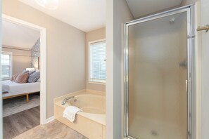 Jetted tub, hair dryer, towels, soap