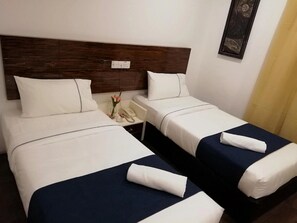 Deluxe Twin Room, 2 Twin Beds | Desk, laptop workspace, free WiFi, bed sheets - Capital O 91016 HOTEL POLLODIUM TRX (Kuala Lumpur)