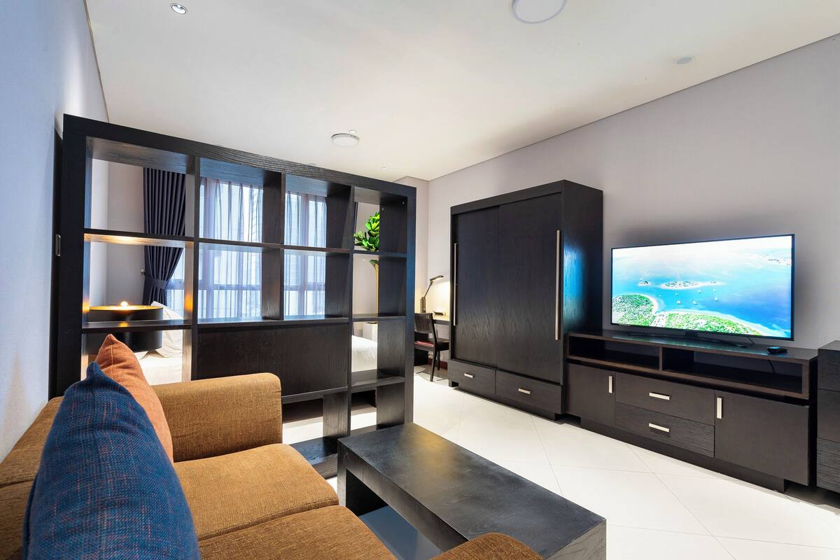Deluxe-Apartment, 1 Schlafzimmer, Stadtblick | Wohnbereich