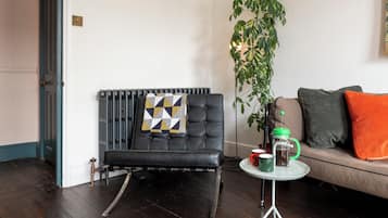 House, City View | Living area | Flat-screen TV