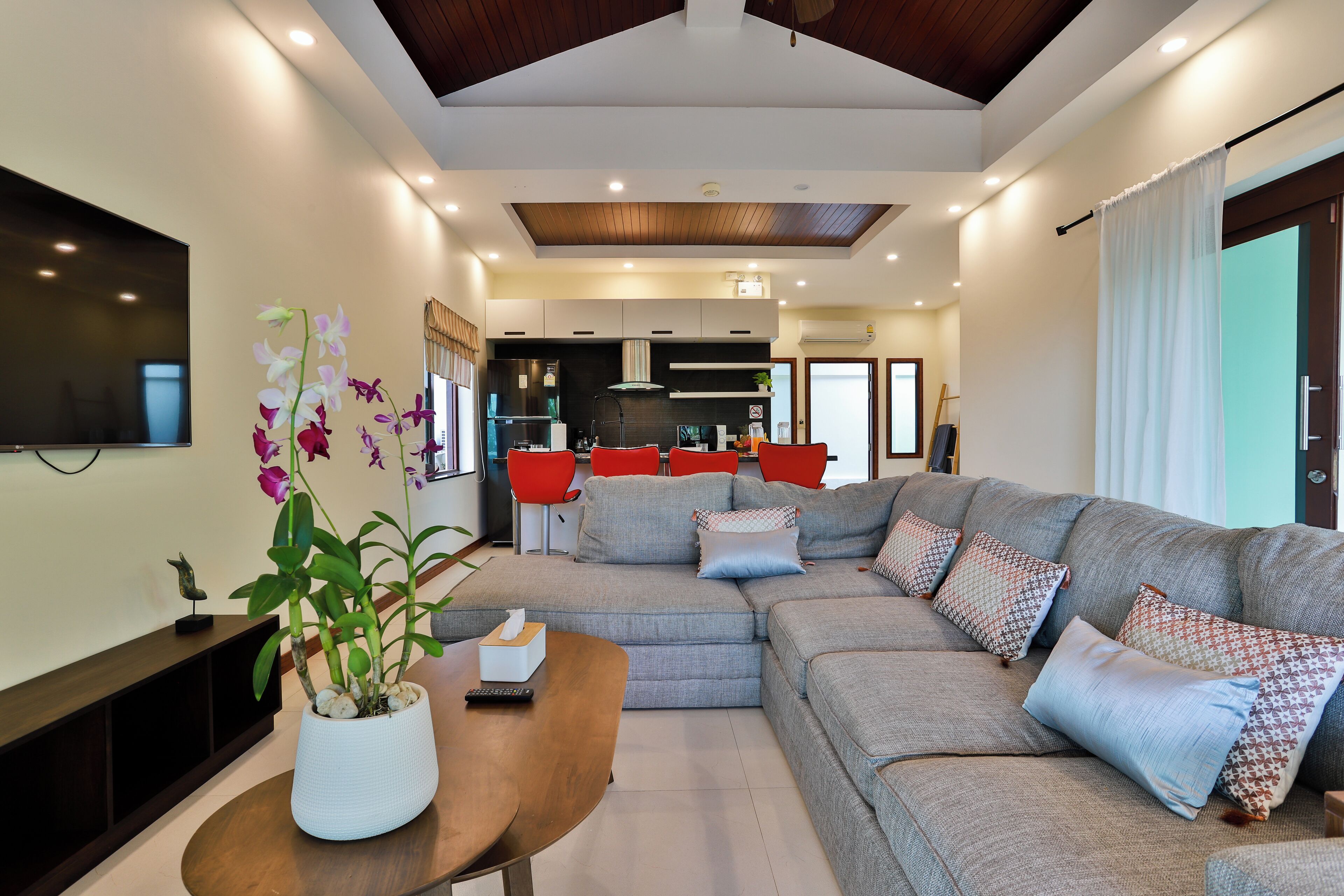 Sriprai Pool Villa | Living area | 20-inch LED TV with cable channels