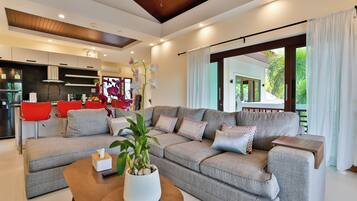 Sriprai Pool Villa | Living area | 20-inch LED TV with cable channels