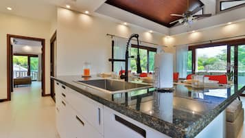 Sriprai Pool Villa | Living room | 20-inch LED TV with cable channels