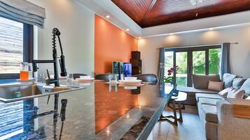 Wanjai Pool Villa | Living room | 20-inch LED TV with cable channels