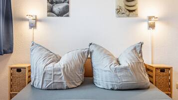 2 slaapkamers, een strijkplank/strijkijzer, gratis wifi, beddengoed