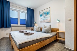 2 habitaciones, tabla de planchar con plancha y wifi gratis 