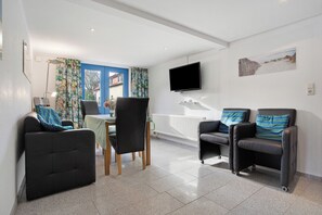 Televisor, reproductor de DVD i estèreo 