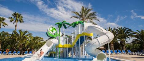 A water park with slides and a pool.
