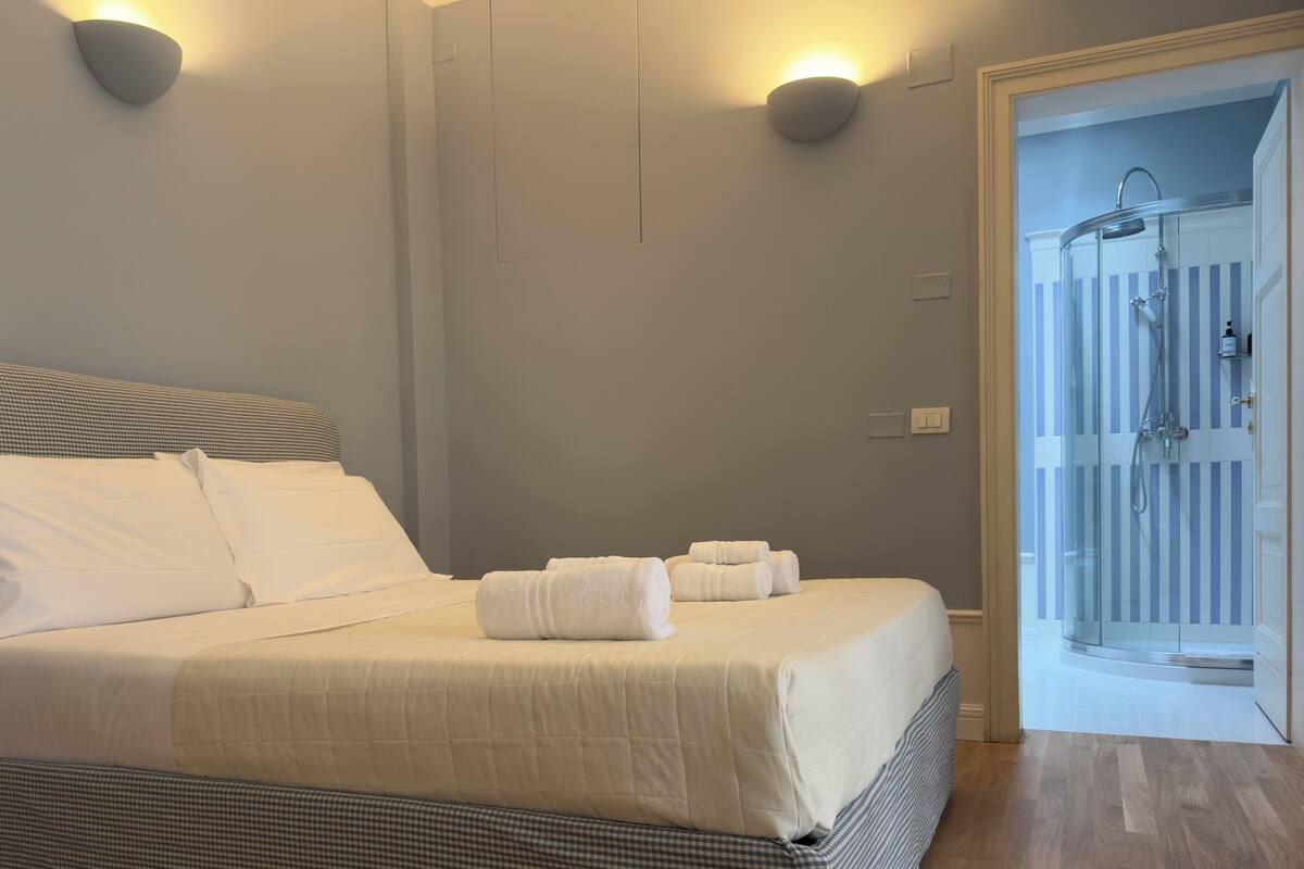 Junior suite, 1 slaapkamer, uitzicht op tuin | 2 slaapkamers, een kluis op de kamer, gratis wifi