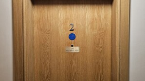 A wooden door with a number "2" and a sign reading "The Old Music Hall". - Class Stays - Room 2 (Shrewsbury)