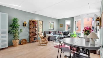 Premium Apartment | Living area | 40-inch TV with cable channels