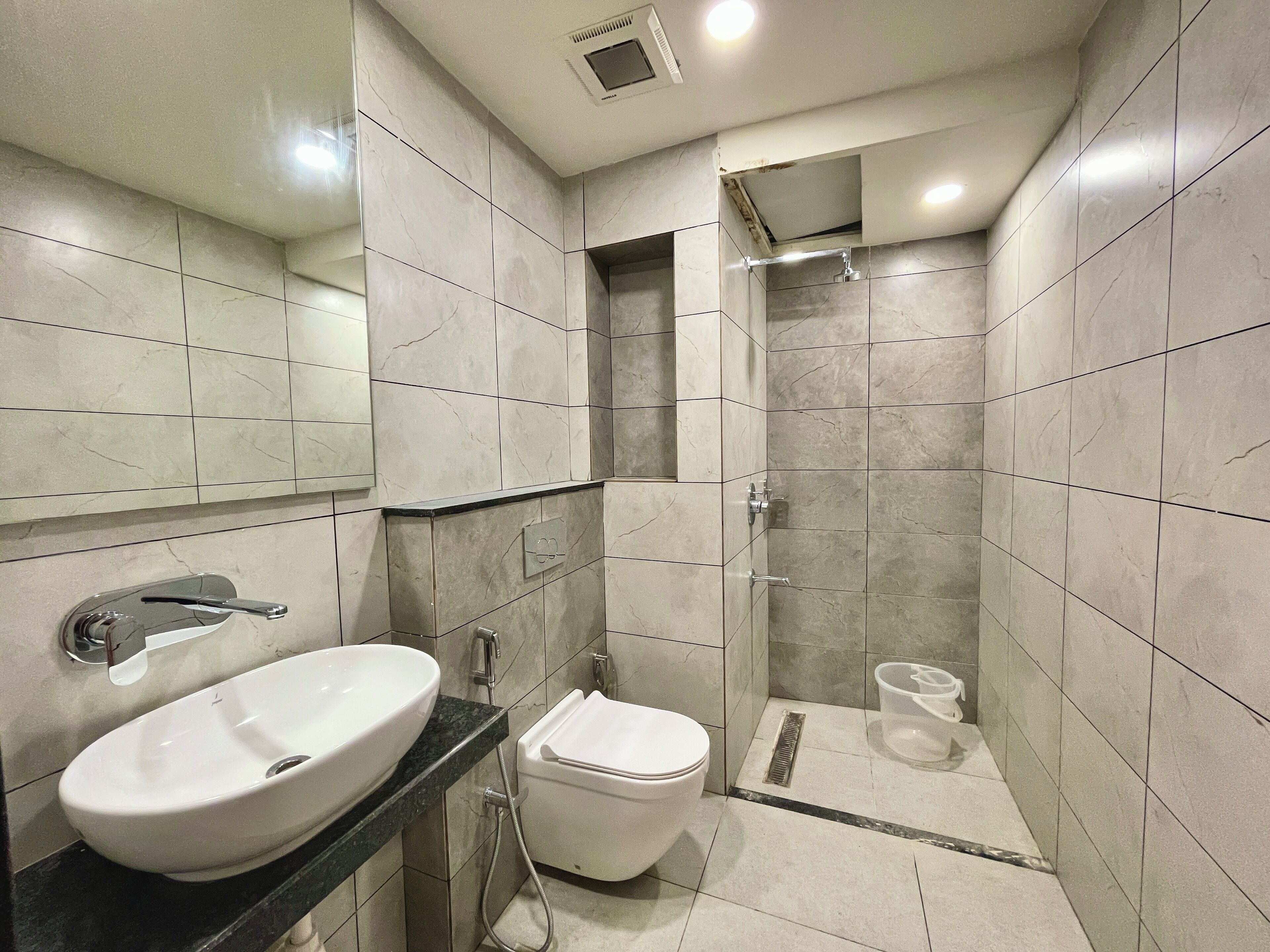 Shower, rainfall showerhead, towels, soap