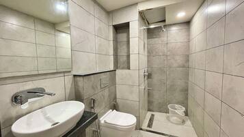 Shower, rainfall showerhead, towels, soap