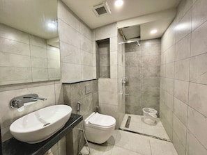 Shower, rainfall showerhead, towels, soap - Hotel Rockbay-near sea beach & temple (Puri)