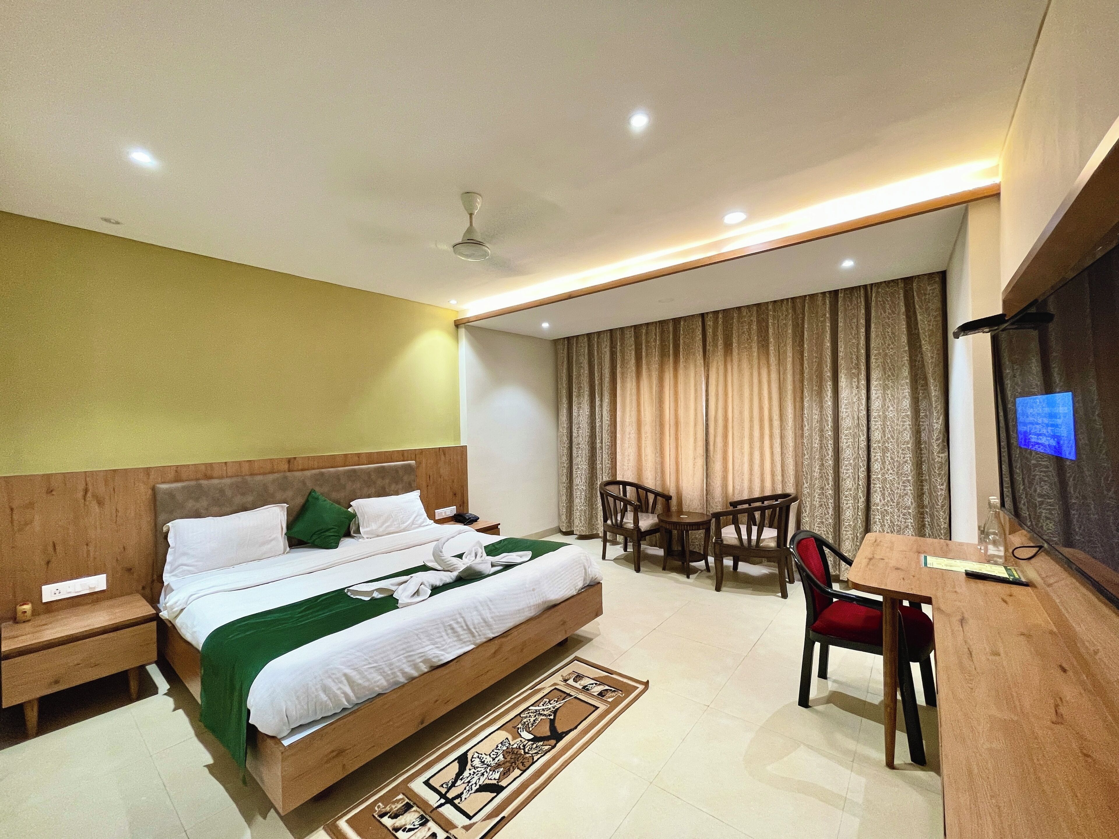 Premium bedding, desk, laptop workspace, soundproofing