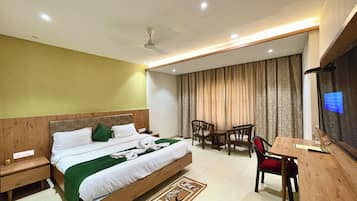 Premium bedding, desk, laptop workspace, soundproofing