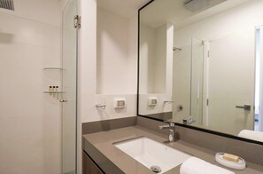 Shower, hair dryer, towels, shampoo