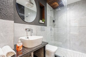 Superior Studio, Balcony, City View | Bathroom | Shower, rainfall showerhead, hair dryer, towels - Street Studio by Lime Tree Hotels (Gurugram)