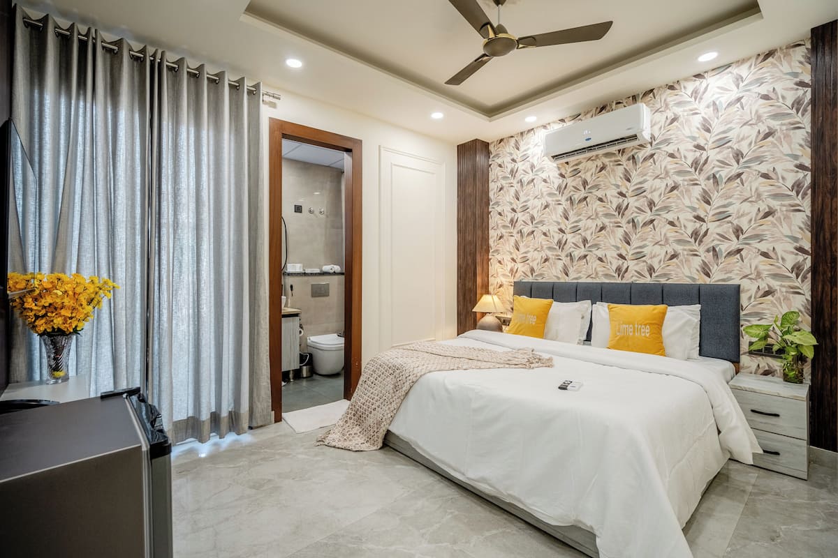 Premium bedding, desk, laptop workspace, soundproofing