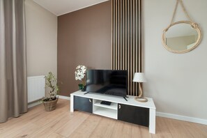 Apartment, 2 Bedrooms, Balcony | Living room | 32-inch flat-screen TV with digital channels - Apartment in Władysławowo by Renters (Wladyslawowo)