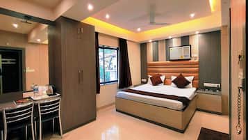 Luxury Suite, City View | 1 bedroom, desk, soundproofing, iron/ironing board