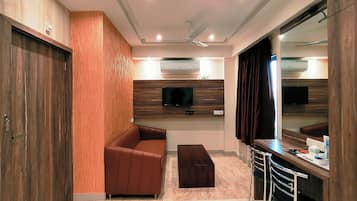 Luxury Suite, City View | 1 bedroom, desk, soundproofing, iron/ironing board